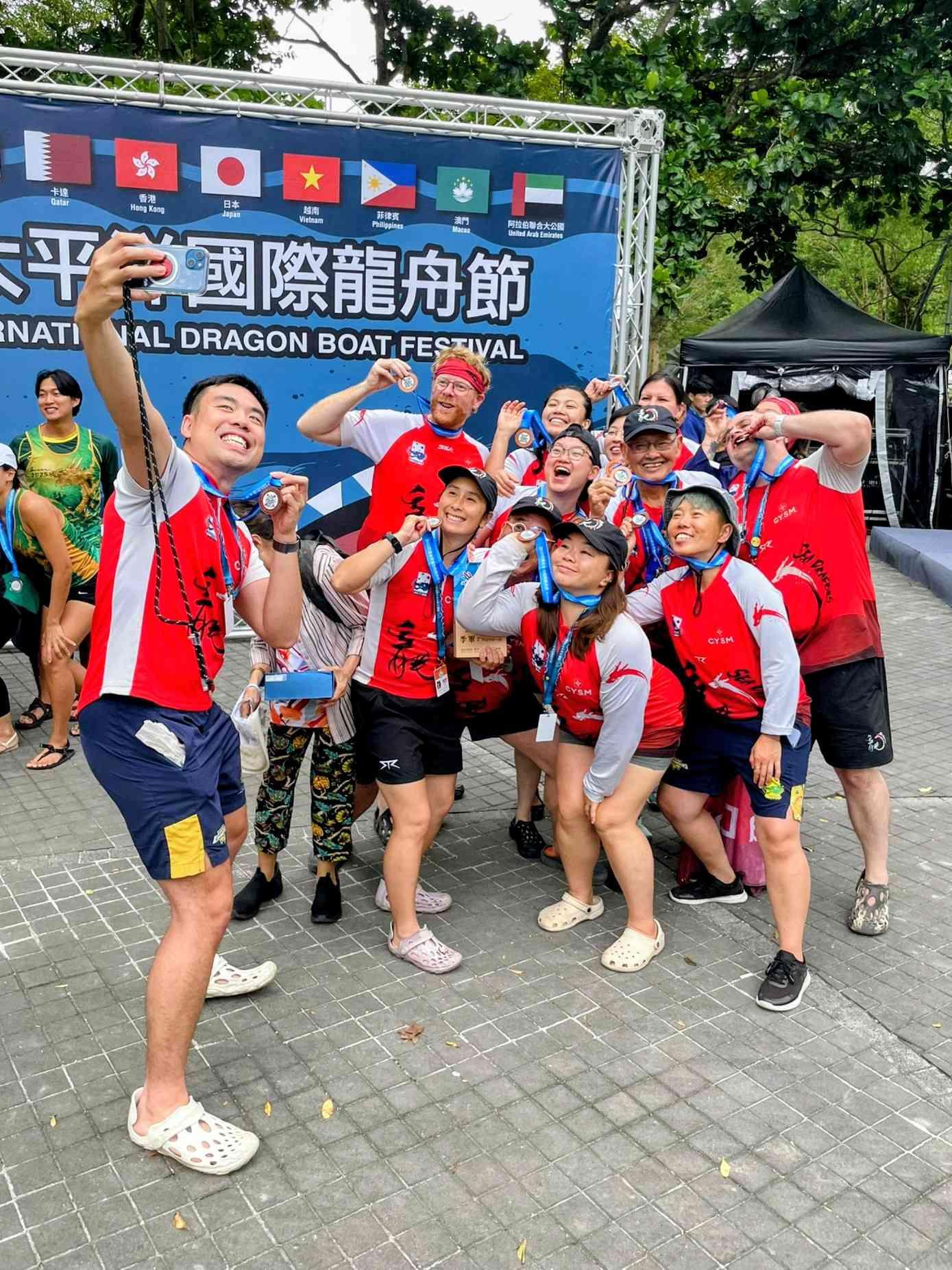 Our team waving our medals around and looking like grinning idiots 